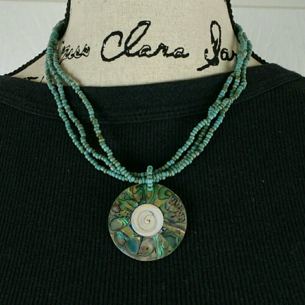 Turquoise-colored beaded necklace shell pendant